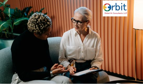HR consultant advising a professional in an office setting – Orbit Global HR Consultants LLP